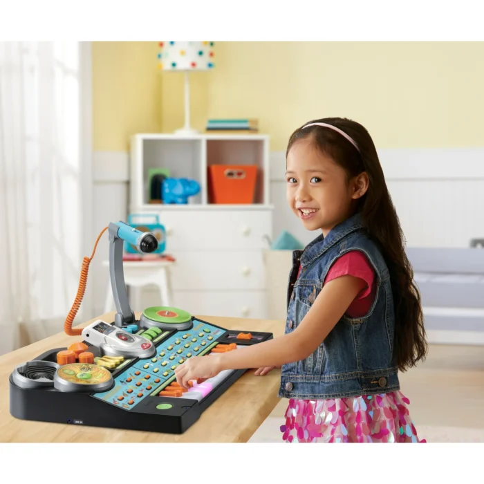 The VTech KidiJamz Studio introduces young musicians to the world of music creation with 61 keys, multiple instrument sounds, and built-in learning activities. This feature-packed keyboard combines musical education with interactive technology to inspire creativity and develop musical skills. Key Features 61 Full-Size Keys - Real piano-style keys for authentic playing experience 40+ Musical Sounds - Piano, guitar, drums, violin, and electronic instruments Built-In Learning Games - Interactive activities teach music fundamentals Record & Playback - Save musical creations and performances Demo Songs - 30 pre-loaded songs for learning and play-along Light-Up Keys - Visual guidance for learning songs and scales Multiple Play Modes - Free play, guided lessons, and creative composition Headphone Compatible - Private practice without disturbing others Durable Construction - Built to withstand enthusiastic young musicians Musical Learning Features Note Recognition - Learn musical note names and positions Rhythm Training - Built-in metronome and rhythm games Scale Practice - Major and minor scale exercises Chord Introduction - Basic chord progressions and harmony Musical Theory - Age-appropriate music education concepts What's Included KidiJamz Studio keyboard with stand Adjustable height stool Music stand for sheet music Power adapter (also works with batteries) Quick start guide and songbook Technical Specifications Keys: 61 full-size velocity-sensitive keys Sounds: 40+ instrument voices and sound effects Songs: 30 demo songs plus learning activities Recording: Multi-track recording capability Display: LCD screen with music notation Power: AC adapter or 6 AA batteries Audio: Built-in speakers plus headphone jack Dimensions: 36" x 12" x 30" (with stand) Educational Benefits ✓ Musical Development - Pitch recognition and rhythm skills ✓ Fine Motor Skills - Hand-eye coordination and finger dexterity ✓ Cognitive Growth - Pattern recognition and memory development ✓ Creative Expression - Composition and improvisation opportunities ✓ Confidence Building - Performance skills and musical achievement Play Modes & Activities Free Play Mode - Explore sounds and create original music Learning Mode - Guided lessons with visual feedback Game Mode - Musical games that teach while entertaining Performance Mode - Play along with demo songs Recording Studio - Create and save musical compositions Age-Appropriate Design Colorful Interface - Engaging visual design for young children Simple Controls - Easy-to-understand buttons and functions Volume Control - Adjustable volume for different environments Sturdy Stand - Stable support for active playing Safety Features - Rounded edges and non-toxic materials Learning Progression Ages 3-4 - Sound exploration and basic key pressing Ages 5-6 - Simple songs and rhythm activities Ages 7-8 - Music reading and composition skills Advanced - Multi-instrumental arrangements and recording Parent & Teacher Features Progress Tracking - Monitor musical development and skills Educational Content - Curriculum-aligned musical learning Quiet Practice - Headphone option for noise control Durability - Built to last through years of learning Value - Professional features at family-friendly price
