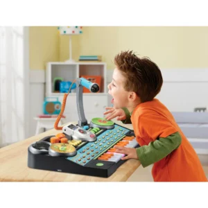 The VTech KidiJamz Studio introduces young musicians to the world of music creation with 61 keys, multiple instrument sounds, and built-in learning activities. This feature-packed keyboard combines musical education with interactive technology to inspire creativity and develop musical skills.
Key Features

61 Full-Size Keys - Real piano-style keys for authentic playing experience
40+ Musical Sounds - Piano, guitar, drums, violin, and electronic instruments
Built-In Learning Games - Interactive activities teach music fundamentals
Record & Playback - Save musical creations and performances
Demo Songs - 30 pre-loaded songs for learning and play-along
Light-Up Keys - Visual guidance for learning songs and scales
Multiple Play Modes - Free play, guided lessons, and creative composition
Headphone Compatible - Private practice without disturbing others
Durable Construction - Built to withstand enthusiastic young musicians

Musical Learning Features

Note Recognition - Learn musical note names and positions
Rhythm Training - Built-in metronome and rhythm games
Scale Practice - Major and minor scale exercises
Chord Introduction - Basic chord progressions and harmony
Musical Theory - Age-appropriate music education concepts

What's Included

KidiJamz Studio keyboard with stand
Adjustable height stool
Music stand for sheet music
Power adapter (also works with batteries)
Quick start guide and songbook

Technical Specifications

Keys: 61 full-size velocity-sensitive keys
Sounds: 40+ instrument voices and sound effects
Songs: 30 demo songs plus learning activities
Recording: Multi-track recording capability
Display: LCD screen with music notation
Power: AC adapter or 6 AA batteries
Audio: Built-in speakers plus headphone jack
Dimensions: 36" x 12" x 30" (with stand)

Educational Benefits
✓ Musical Development - Pitch recognition and rhythm skills
✓ Fine Motor Skills - Hand-eye coordination and finger dexterity
✓ Cognitive Growth - Pattern recognition and memory development
✓ Creative Expression - Composition and improvisation opportunities
✓ Confidence Building - Performance skills and musical achievement
Play Modes & Activities

Free Play Mode - Explore sounds and create original music
Learning Mode - Guided lessons with visual feedback
Game Mode - Musical games that teach while entertaining
Performance Mode - Play along with demo songs
Recording Studio - Create and save musical compositions

Age-Appropriate Design

Colorful Interface - Engaging visual design for young children
Simple Controls - Easy-to-understand buttons and functions
Volume Control - Adjustable volume for different environments
Sturdy Stand - Stable support for active playing
Safety Features - Rounded edges and non-toxic materials

Learning Progression

Ages 3-4 - Sound exploration and basic key pressing
Ages 5-6 - Simple songs and rhythm activities
Ages 7-8 - Music reading and composition skills
Advanced - Multi-instrumental arrangements and recording

Parent & Teacher Features

Progress Tracking - Monitor musical development and skills
Educational Content - Curriculum-aligned musical learning
Quiet Practice - Headphone option for noise control
Durability - Built to last through years of learning
Value - Professional features at family-friendly price